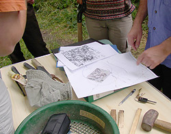 Checking the plans before the actual dig begins